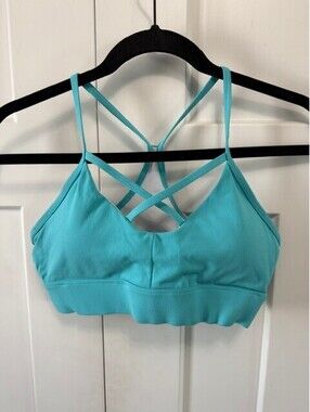 NVGTN Turquoise blue sports bra size medium excellent condition